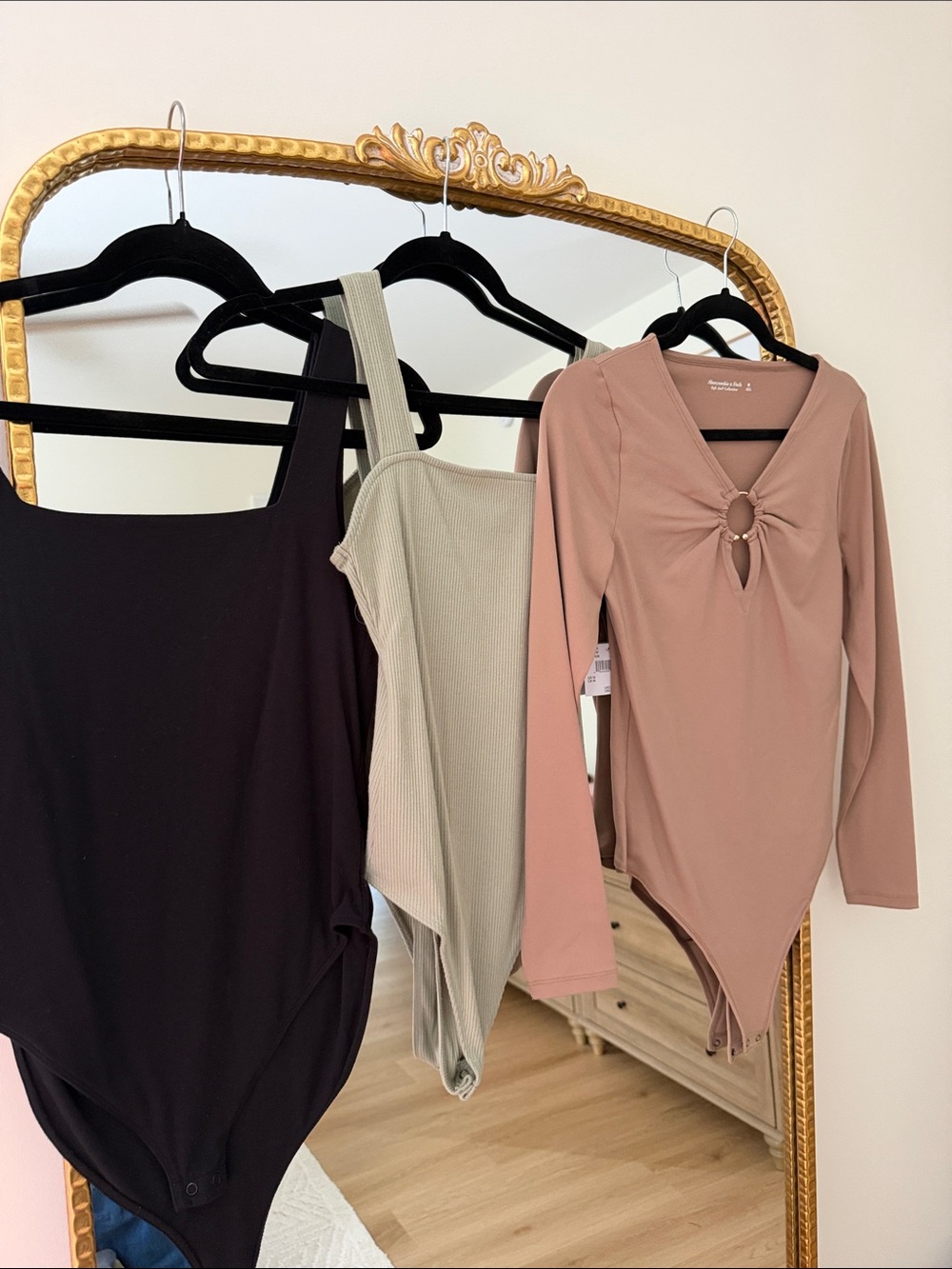 Assorted body suits (7)